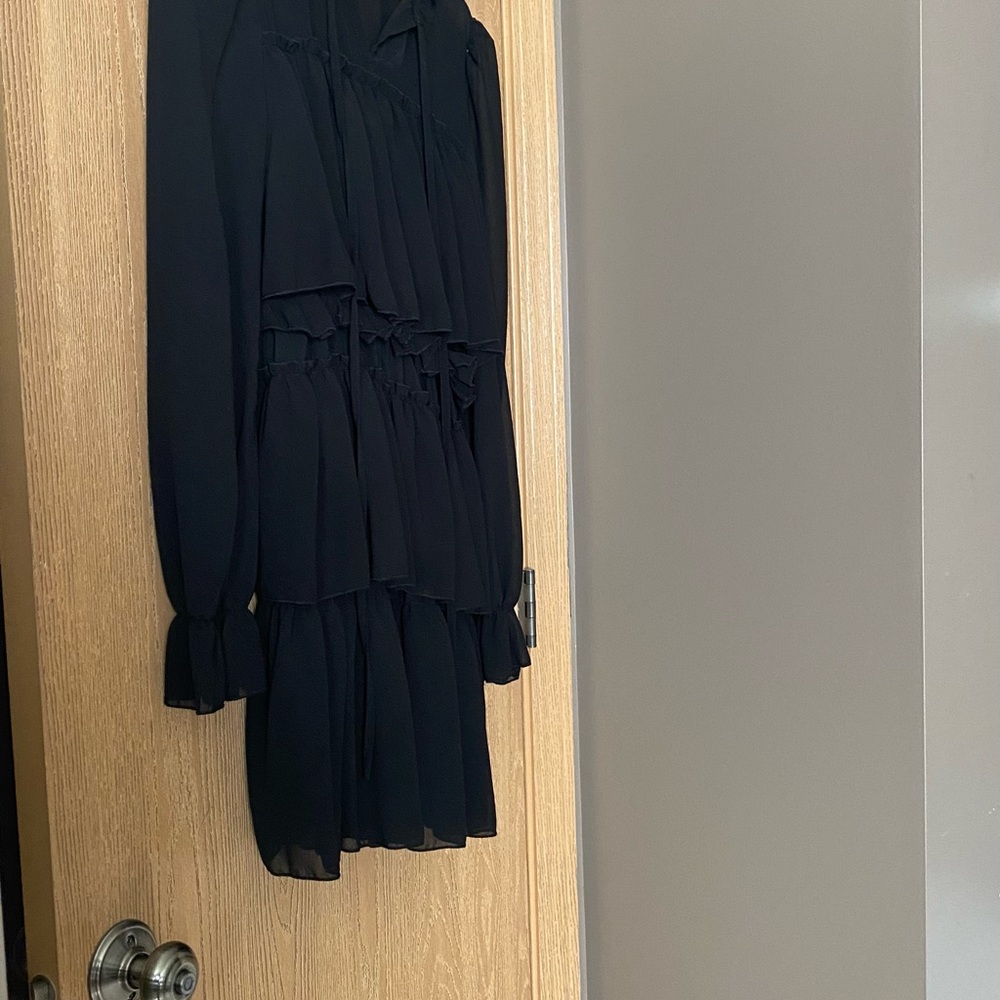 This black beautiful dress is very flattering